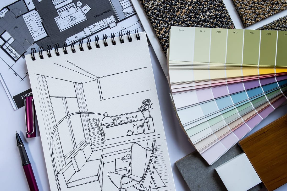 Sketchbook drawing of a living room with paint swatches